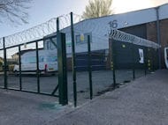 Razor Wire Atop Mesh Fence